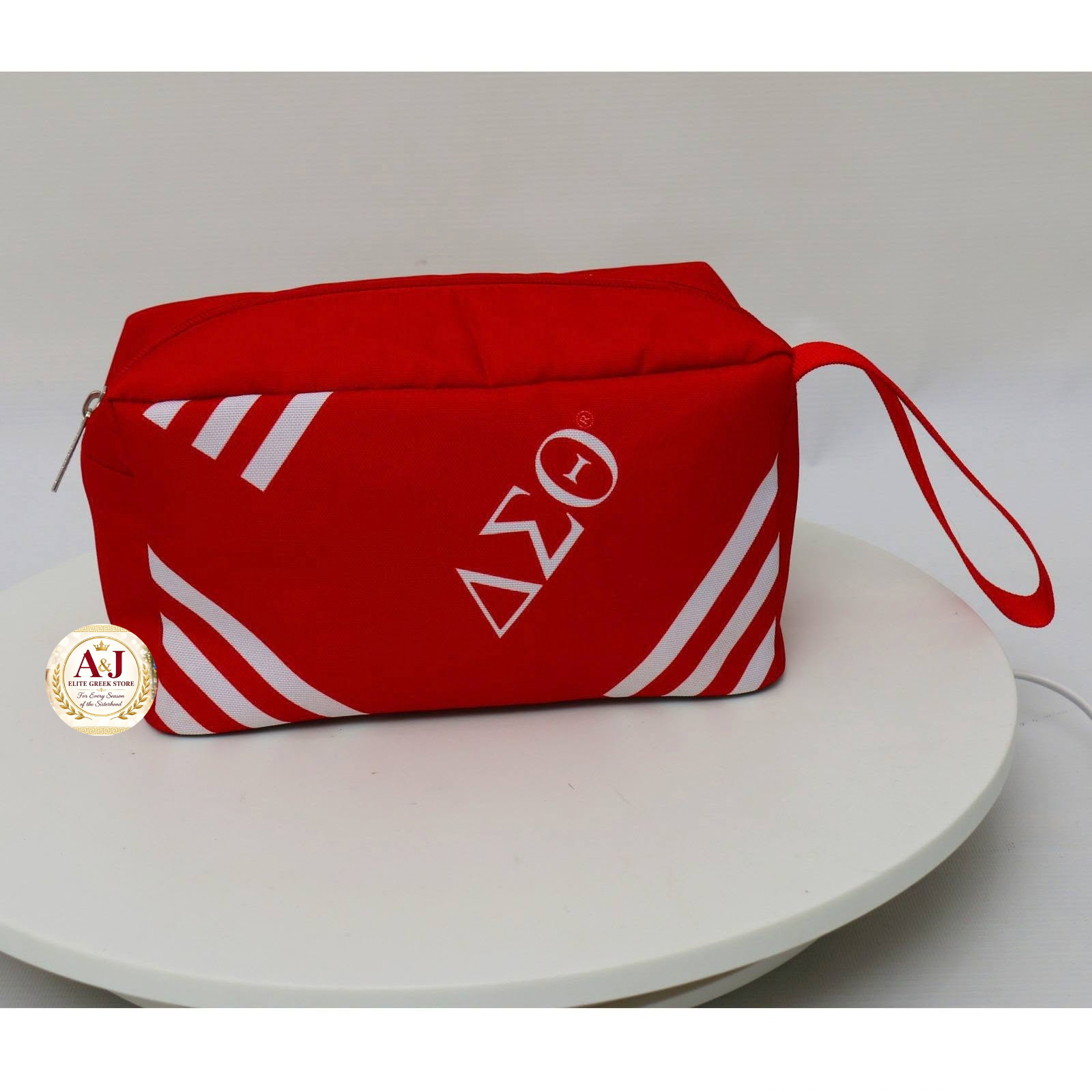 Red and white Delta Sigma Theta striped toiletry wristlet